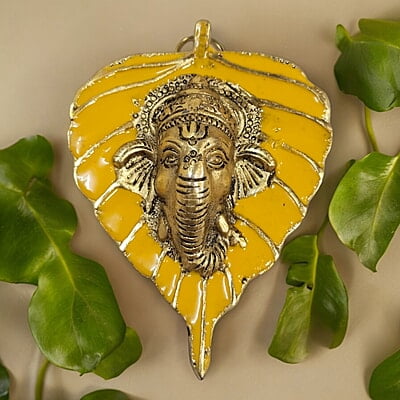 Mini Enamel Leaf Ganesh Yellow color Aluminium Idol