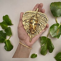 Mini Enamel Leaf Ganesh Gold color Aluminium Idol